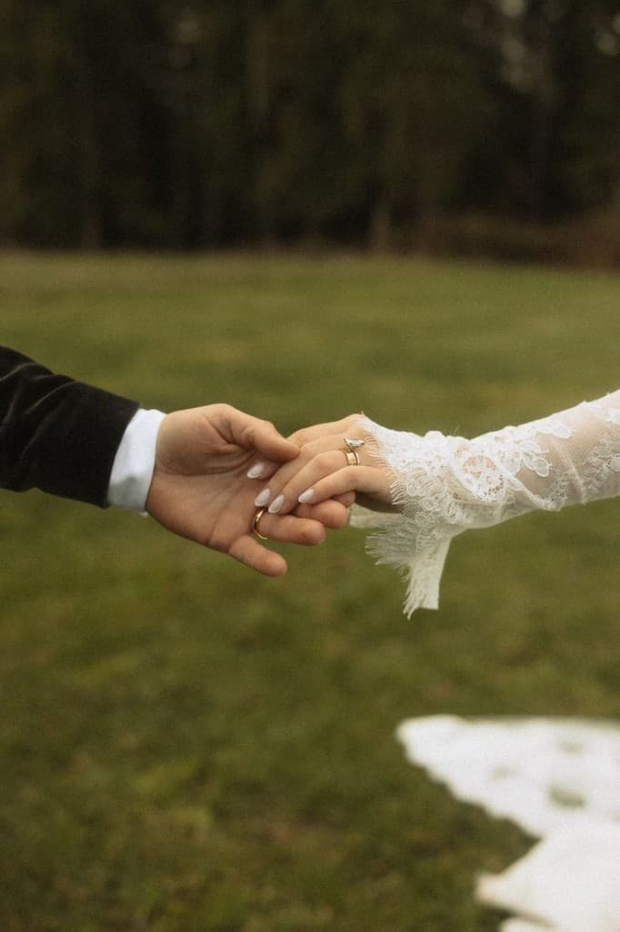Couple holding hands